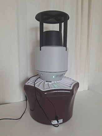 Figure 9 – Vectrack sensor mounted on a trap, with the Power and Trap cables connected